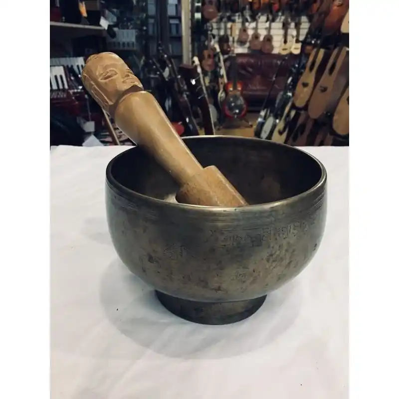Deal Singing bowl, Naga type. With beater.