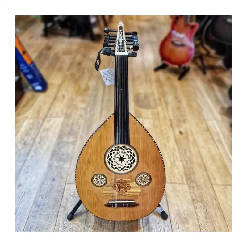 Genuine Arabic style oud, walnut back, cedar top, ebony fingerboard, made in Cardiff by Sultan Anazi