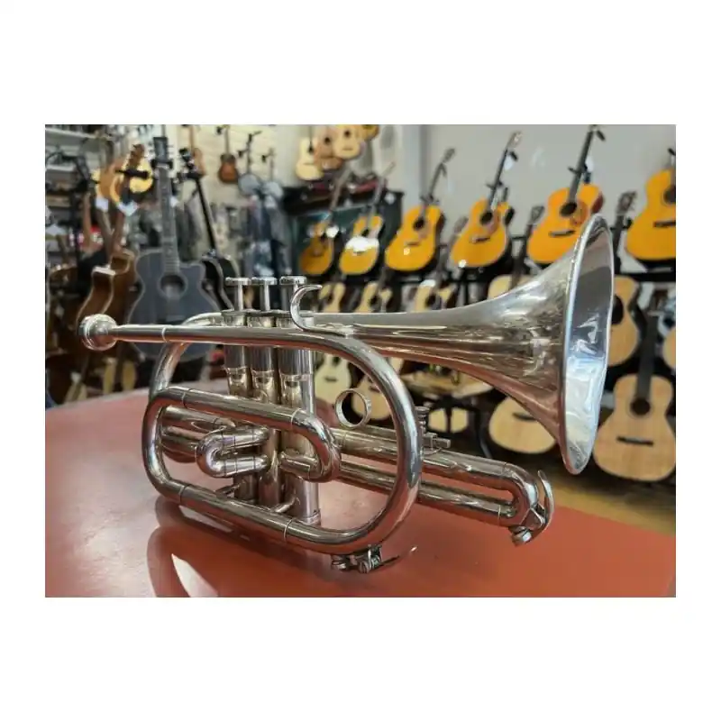 Fast Shipping Besson 600 Cornet, Silver. Nice playable cornet, good tone. A few small dents.With tatty broken case.